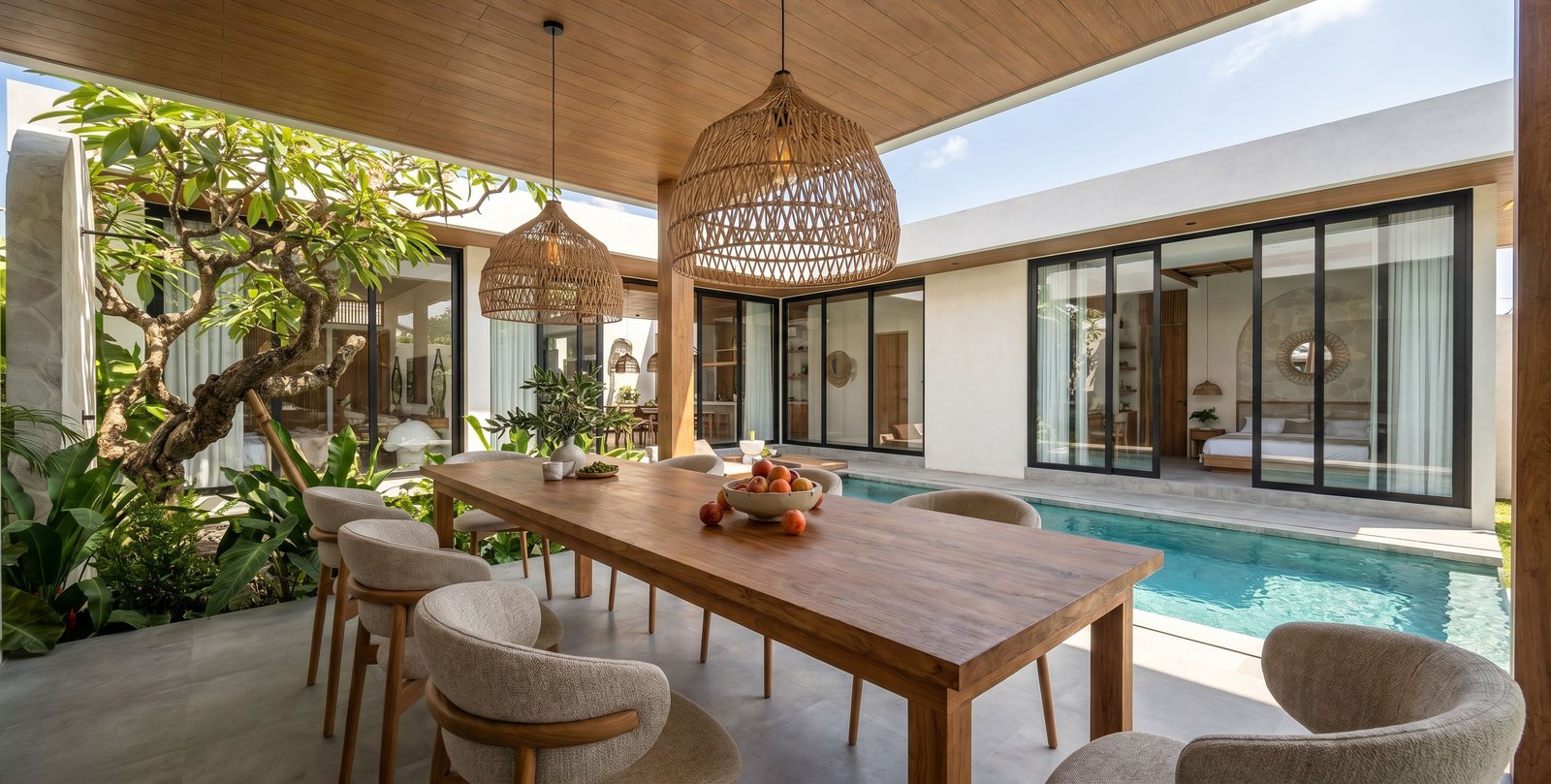 Alfresco dining pavilion beside the pool at a Tana villa